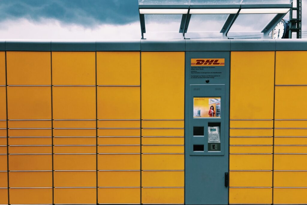 yellow and gray DHL concrete building